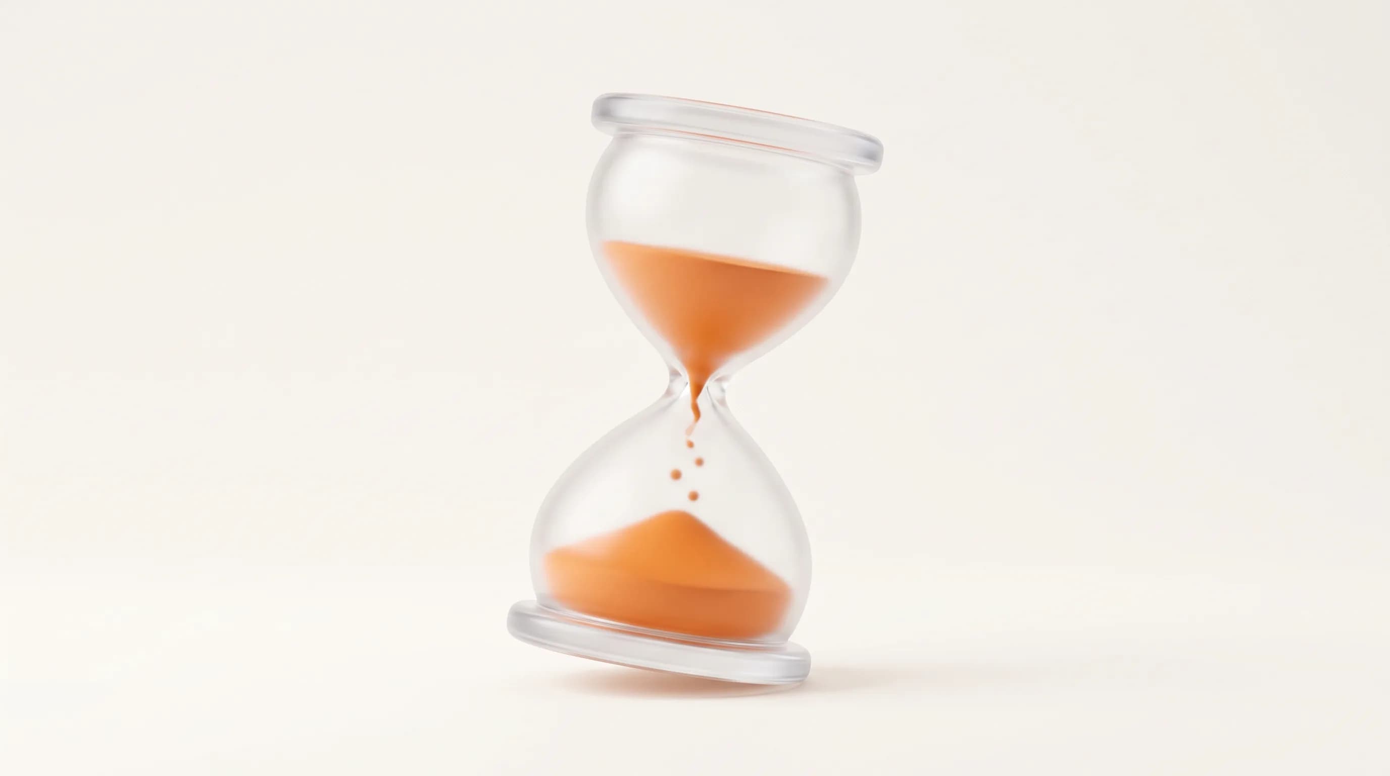 A glass hourglass with slow-flowing orange sand represents the real benchmark that matters now, how long users truly engage on a page.